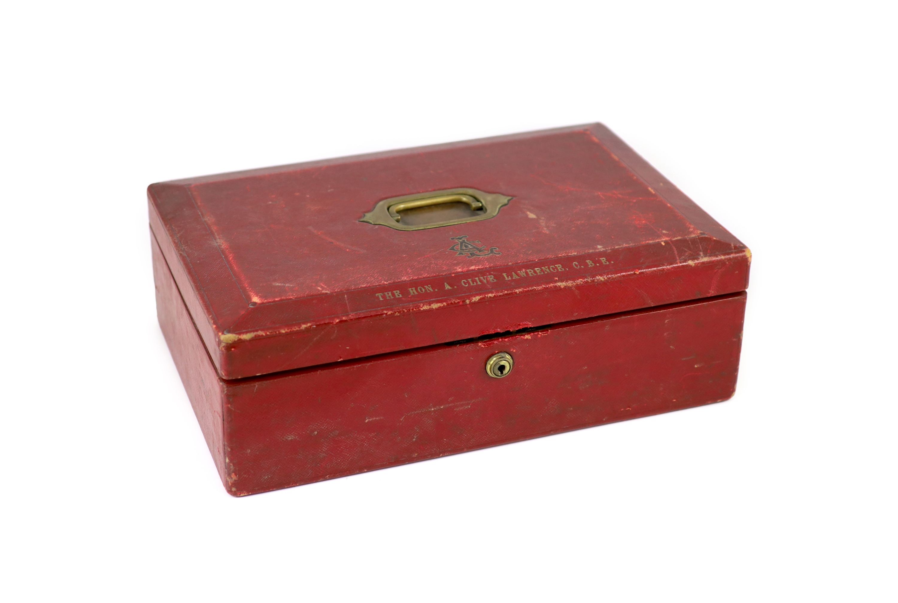 A red leather Morocco leather dispatch box 'The Hon A. Clive Lawrence C.B.E.' by John Peck & Son, Nelson Square, Blackfriars, 46 cm wide